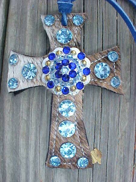 Brown Brindle and White Saddle Cross with Light Blue and Sapphire Crystals on a Silver and Gold Berry Concho